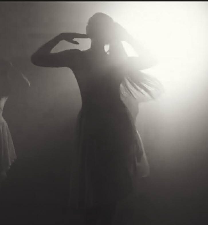 Kate dancing and performing in the music video Holding Out For a Hero by the band Icarus Lives.