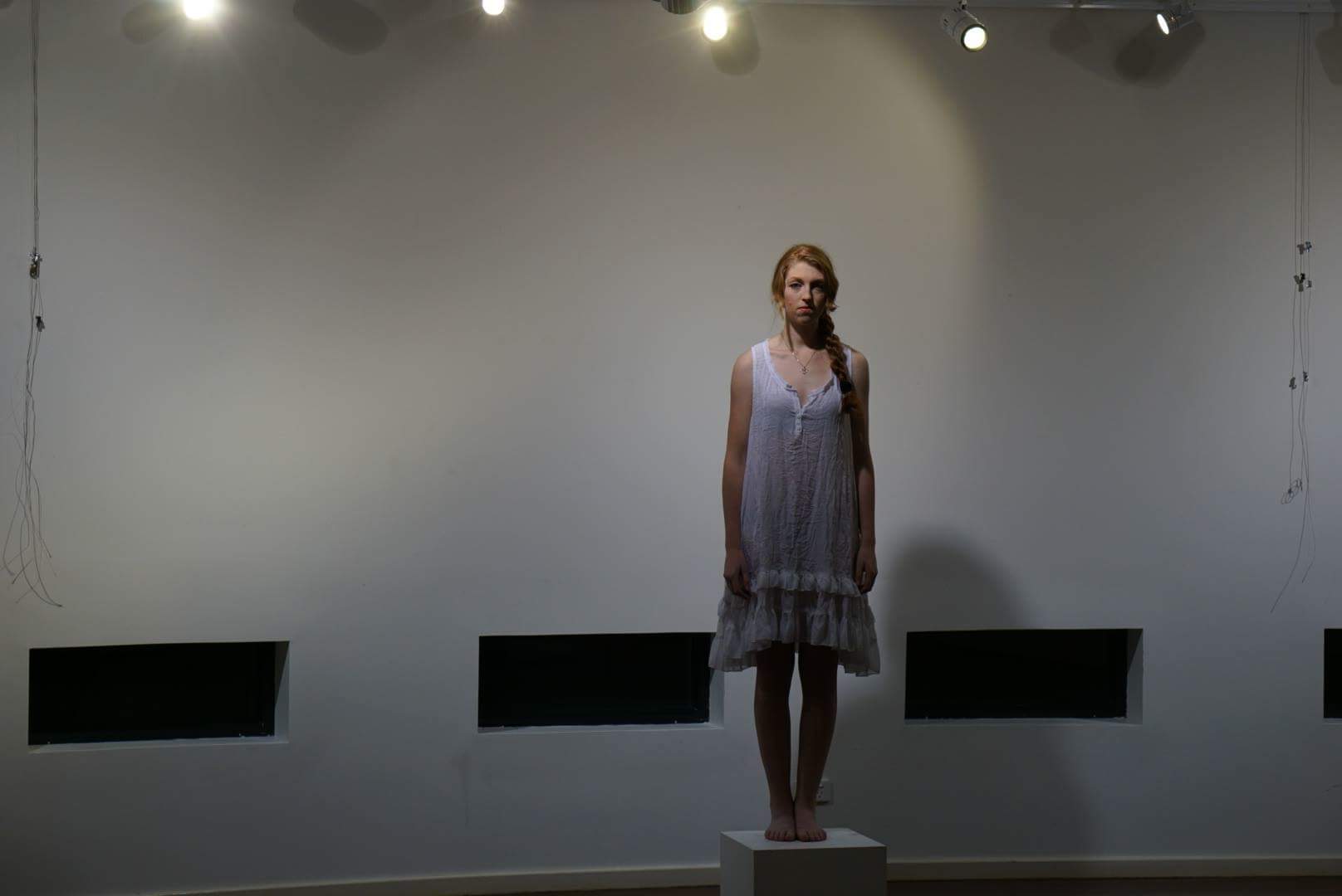 Kate acting and performing in the live theatre production The Darkness.