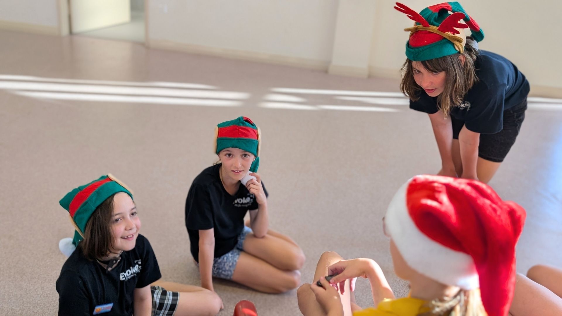 Kids planning and creating together in a drama class at Evoke, Palmyra Perth.